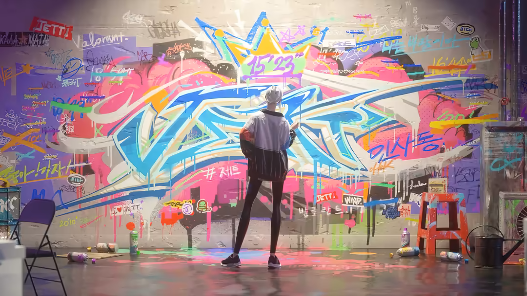 Artist standing before vibrant neon graffiti wall with blue, pink, and yellow street art designs and bold lettering