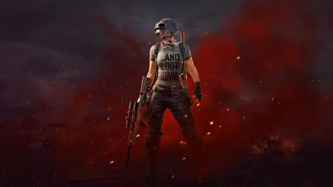 Armed PUBG character standing confidently amid red explosive flames and smoke, wearing tactical gear and helmet against dark