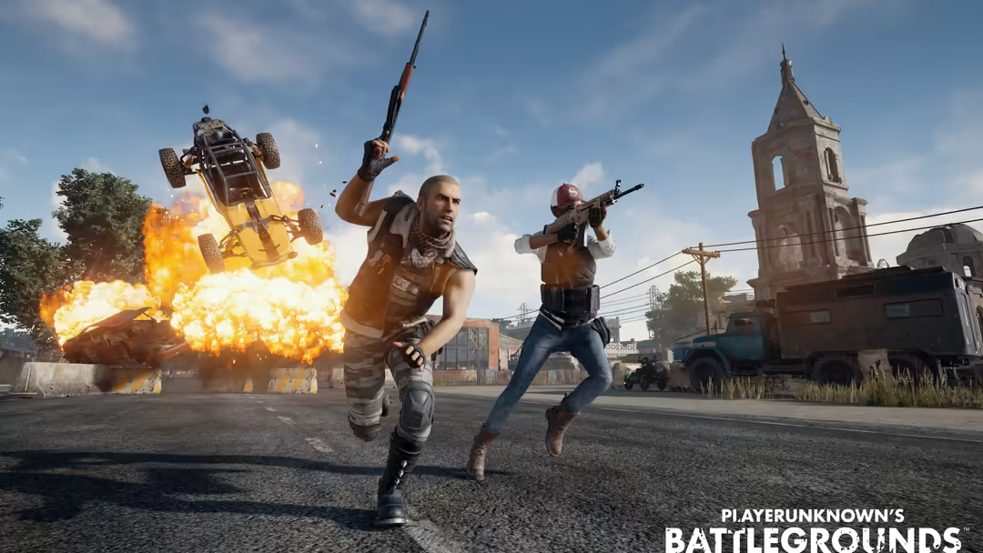 PUBG characters in tactical gear amid explosive action and destruction, with armed soldiers and burning vehicles in intense c