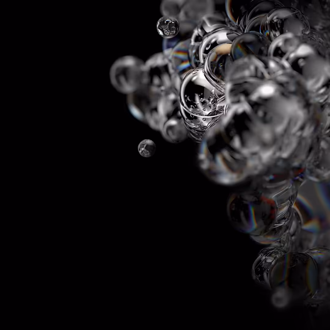 Abstract composition of crystalline bubbles with prismatic refraction and dark background, featuring metallic spheres with li