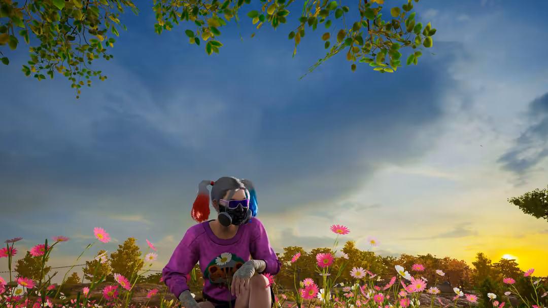 Player in purple shirt and gas mask sits among vibrant pink and white flowers at sunset in a scenic field landscape