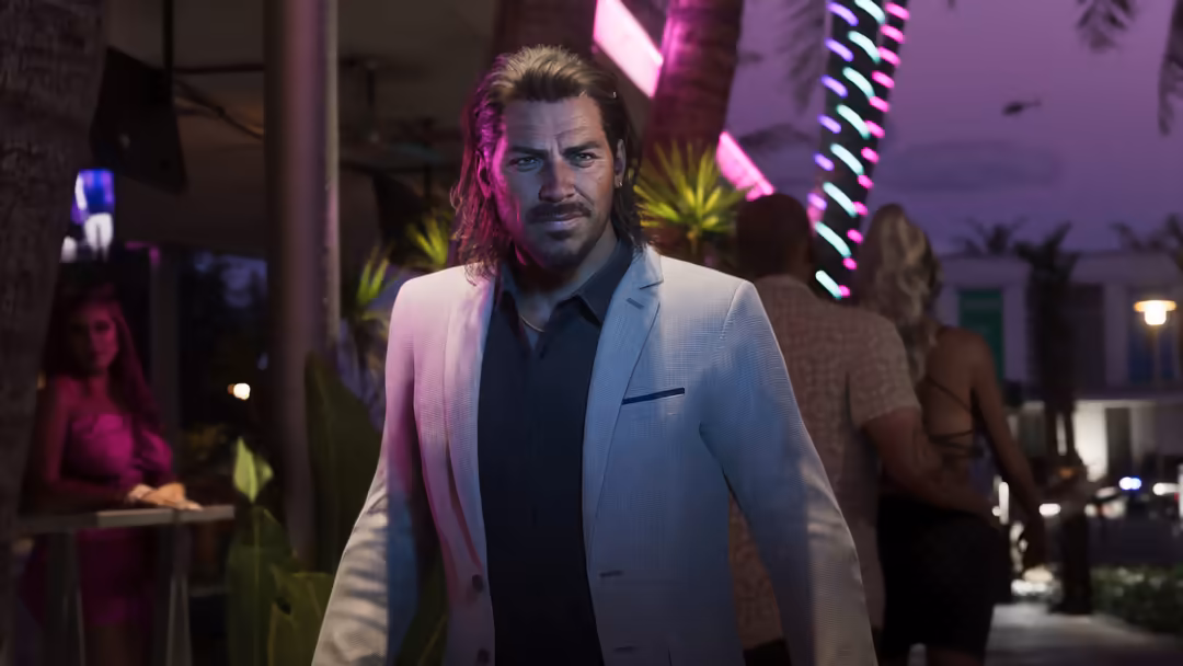Man in light blazer under vibrant neon purple and pink lighting in futuristic urban setting with palm trees and nightlife atm
