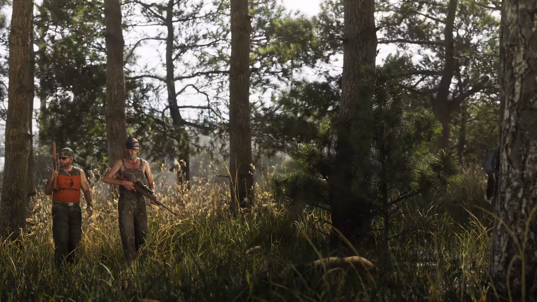 Two characters in hunting gear walking through dense forest with tall trees and golden grass in GTA VI gameplay scene