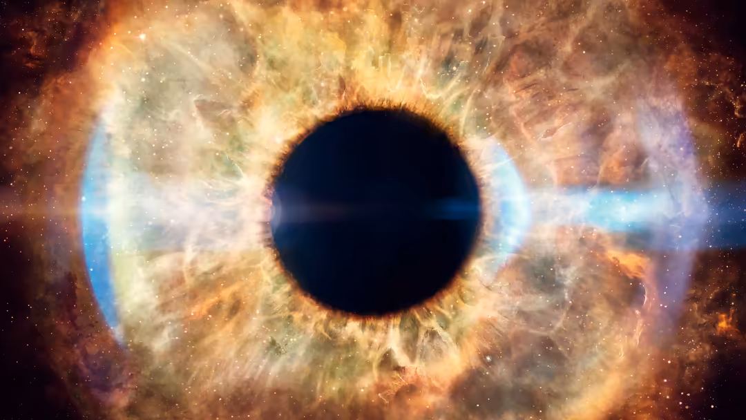 Stunning helix nebula resembling a cosmic eye with golden and blue glowing gas clouds surrounding a dark center in deep space