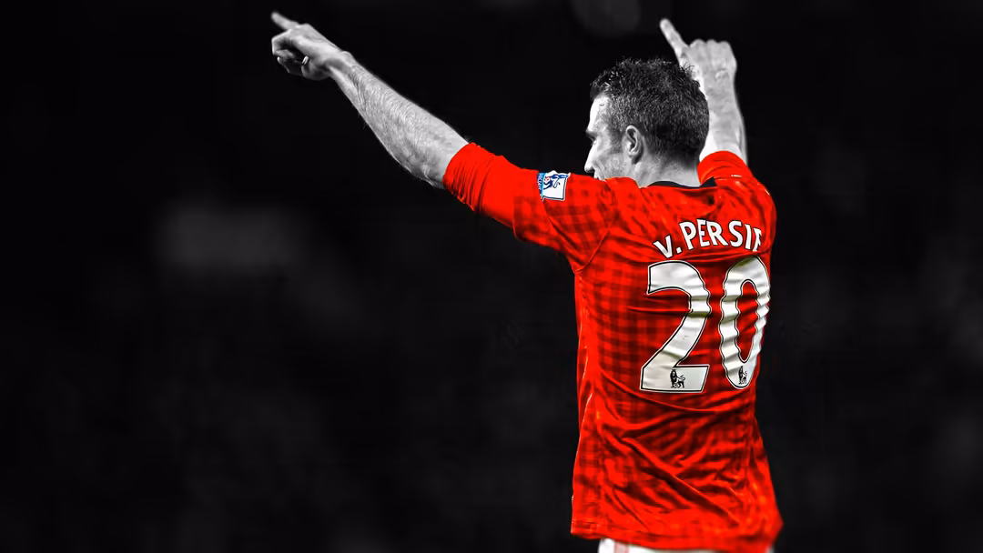 Soccer player in red jersey with number 20 celebrating with fist raised against dark background in dramatic action pose