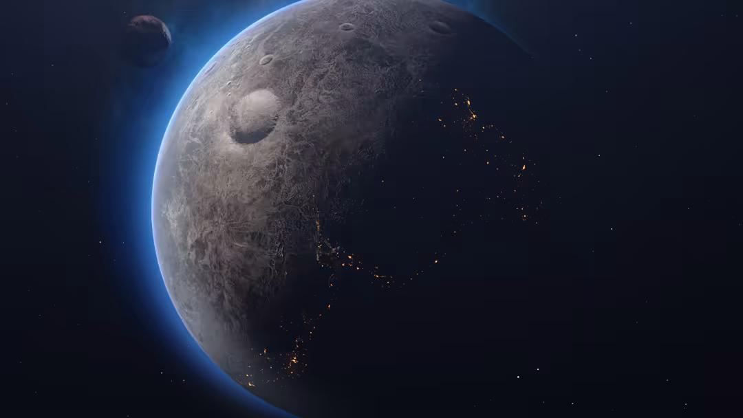 Illuminated dwarf planet Ceres with cratered surface and glowing blue rim against starfield, with smaller moon visible in bac