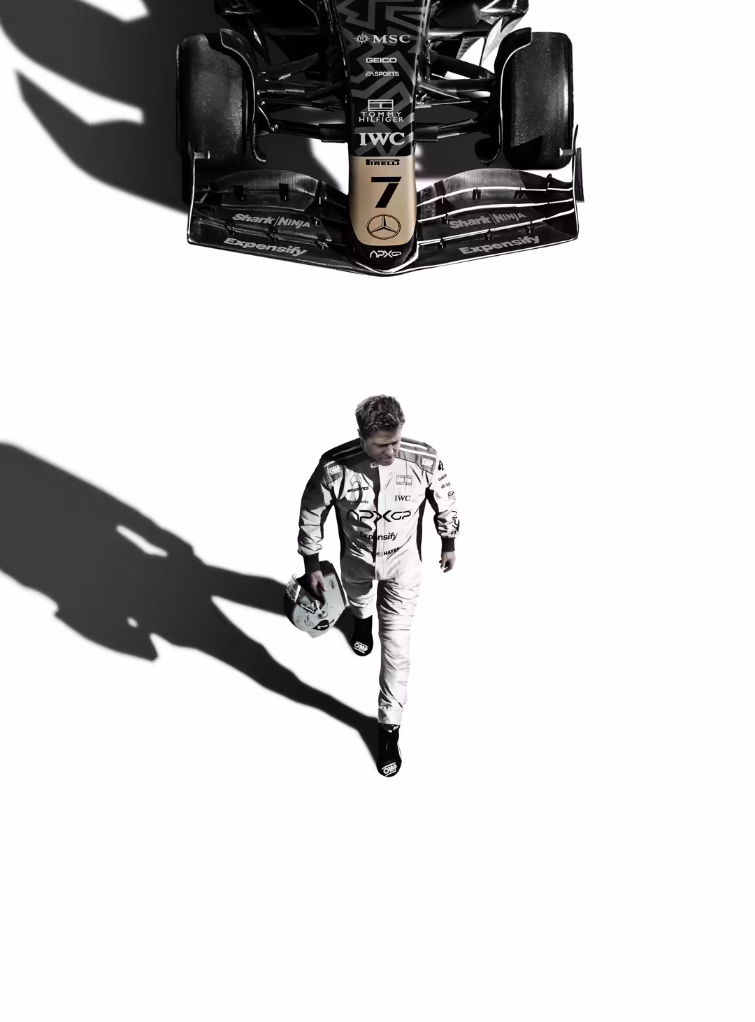 Black and white minimalist composition of F1 racing driver in suit holding helmet with race car above, dramatic shadows on wh