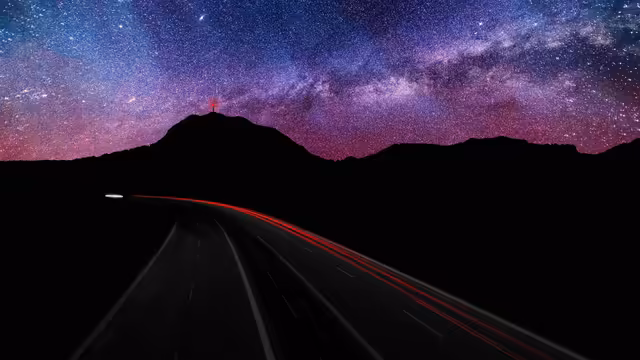 Mountain Silhouette Under Starry Sky