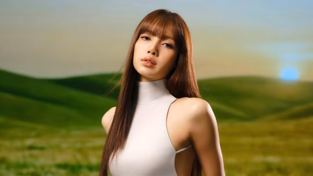 Lisa with long brown hair and bangs wearing white sleeveless top against soft green rolling hills and pastel sky background i