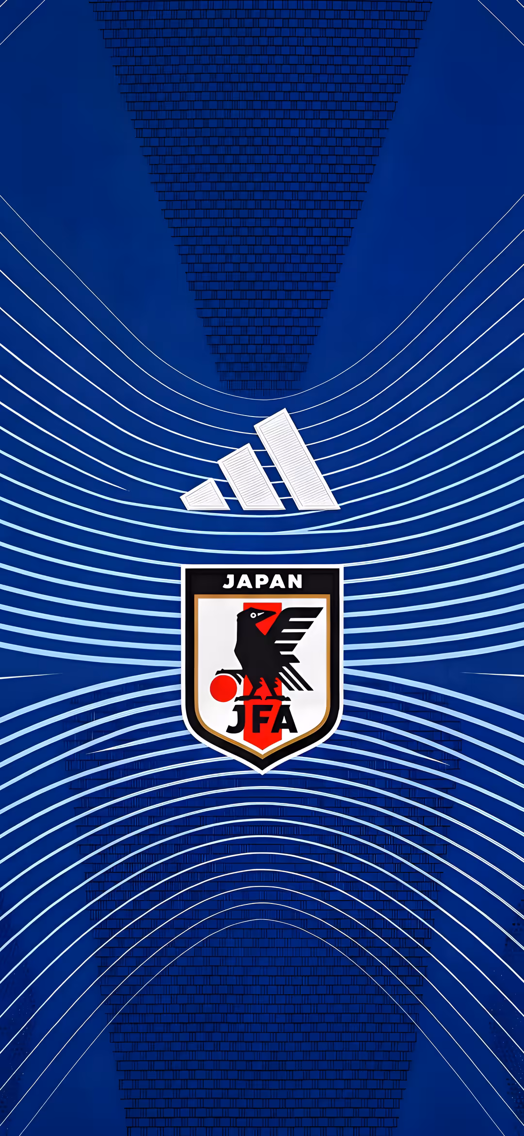 Vertical deep blue background with curving white lines, a white Adidas logo, and the Japan Football Association (JFA) crest featuring the black Yatagarasu crow and red sun.