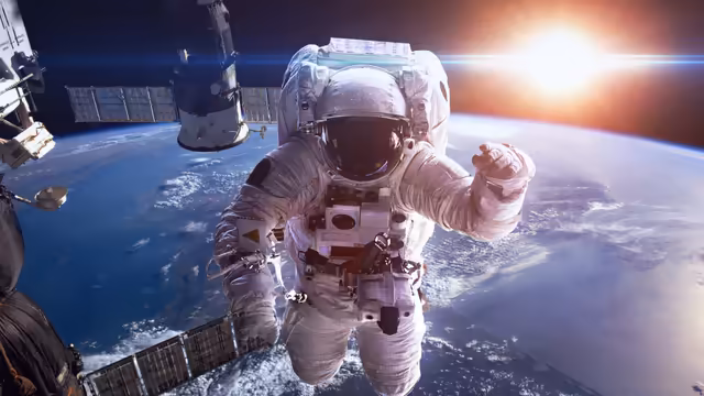 Astronaut Floating Above Earth in Space
