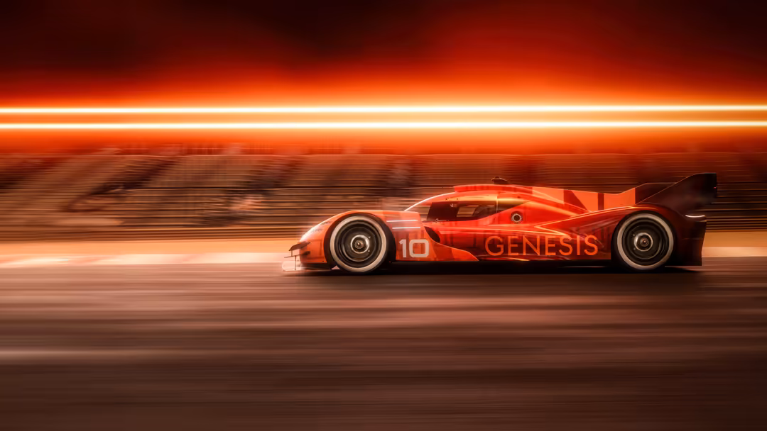 Red Genesis GMR-001 hypercar speeding past glowing neon lights with motion blur effect