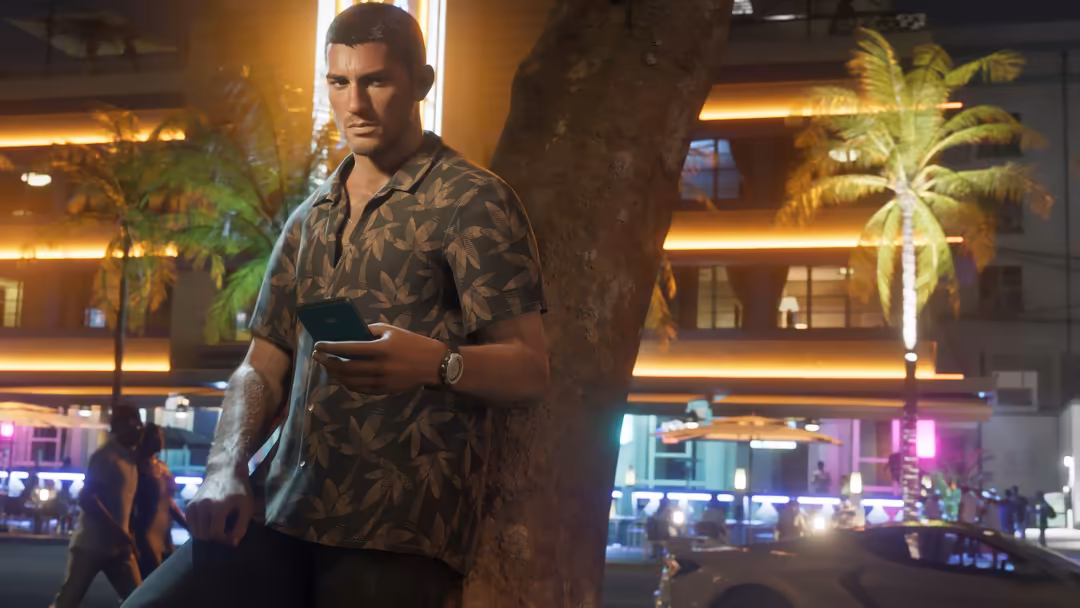 Man in patterned shirt holding phone under glowing neon lights in futuristic urban setting with palm trees