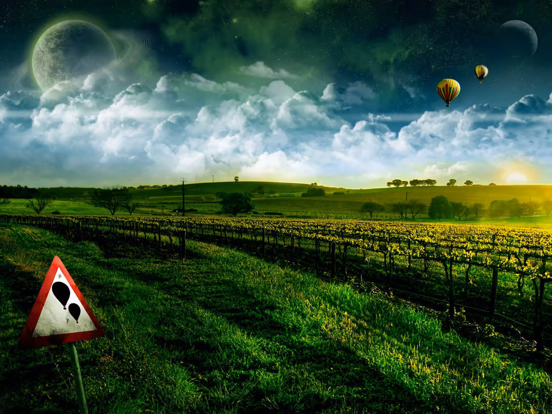 Surreal landscape with luminous moon, fluffy white clouds, golden fields, and yellow hot air balloons floating in dreamy gree