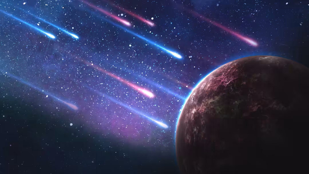 A celestial scene depicting a glowing planet with blue and pink meteors streaking across a starry night sky background.