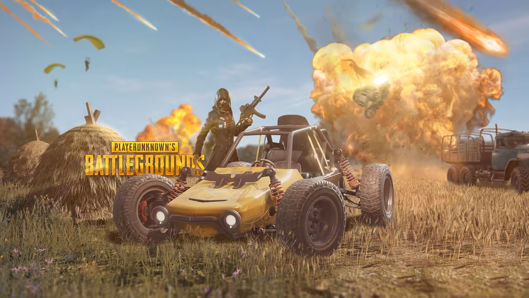 PUBG battle royale scene with armored buggy and armed player amid explosions, parachutes, and desert battlefield chaos