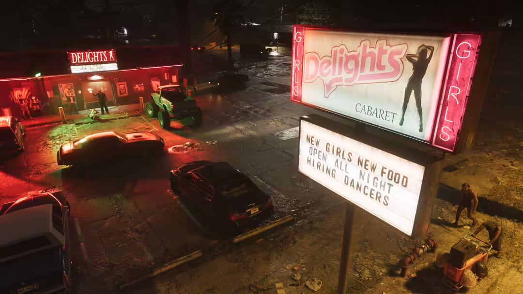 Neon-lit nightclub storefront with pink and red glowing signs advertising cabaret entertainment on a dark urban street at nig