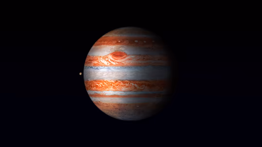 Jupiter with its distinctive red Great Spot and swirling orange and white cloud bands against the black void of space with a