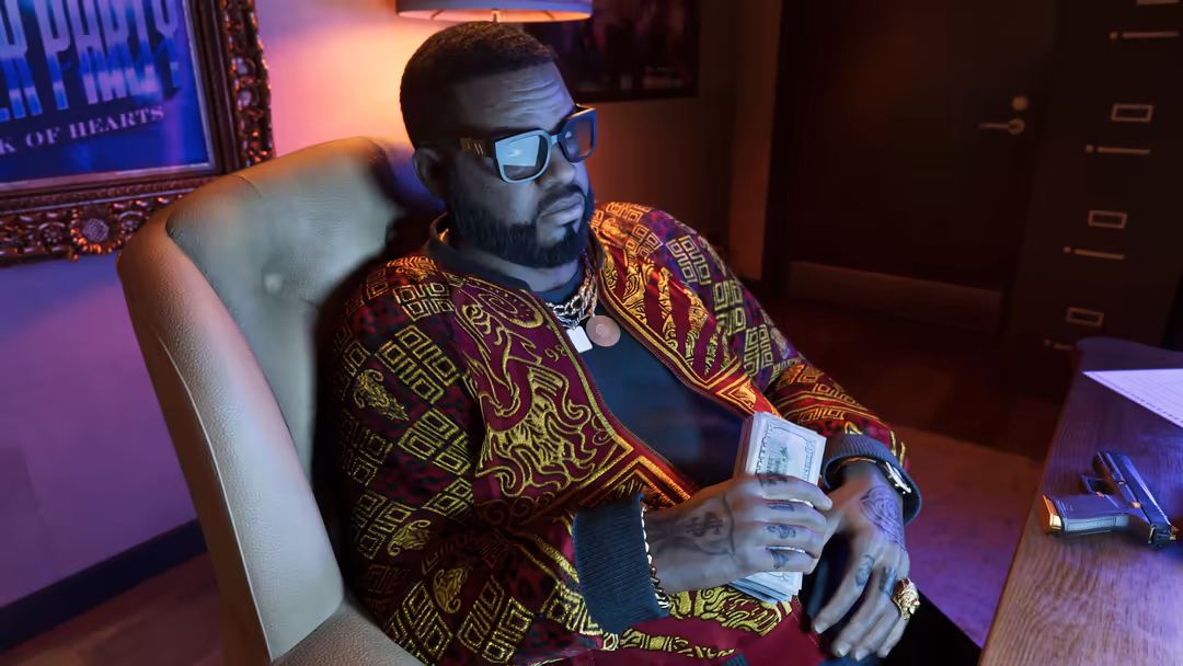 Man in ornate patterned jacket and sunglasses sitting in neon-lit office chair, holding cash in luxury interior setting