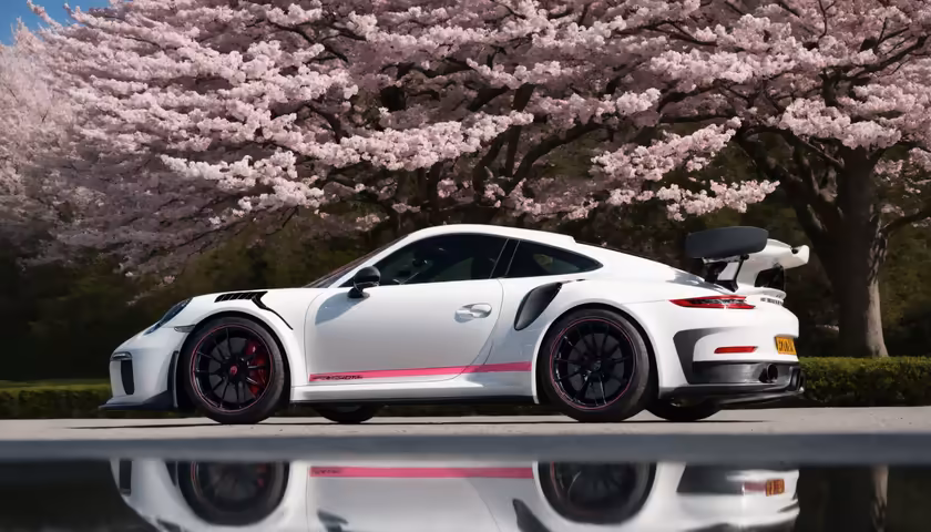 White Sports Car Cherry Blossoms