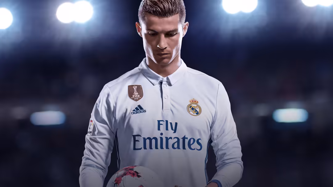 Cristiano Ronaldo in white Real Madrid jersey holding a soccer ball under stadium lights with dramatic blue lighting and dark