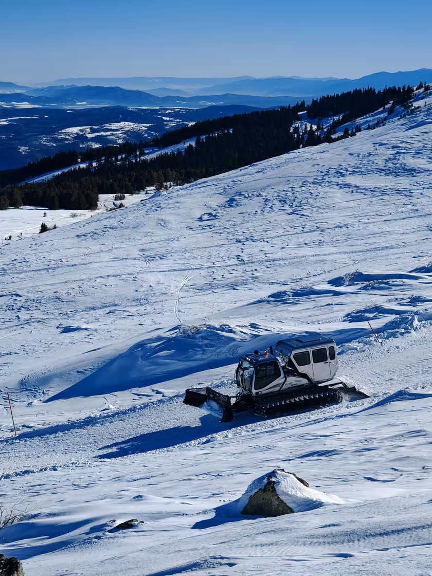 Snowcat Grooming Ski Slope – Winter Mountain Wallpaper