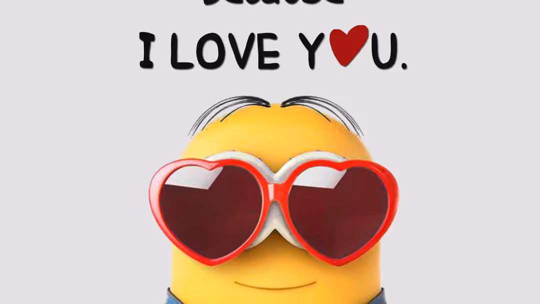 Smiling yellow minion character wearing heart-shaped red glasses with text 'I LOVE YOU' above on light background