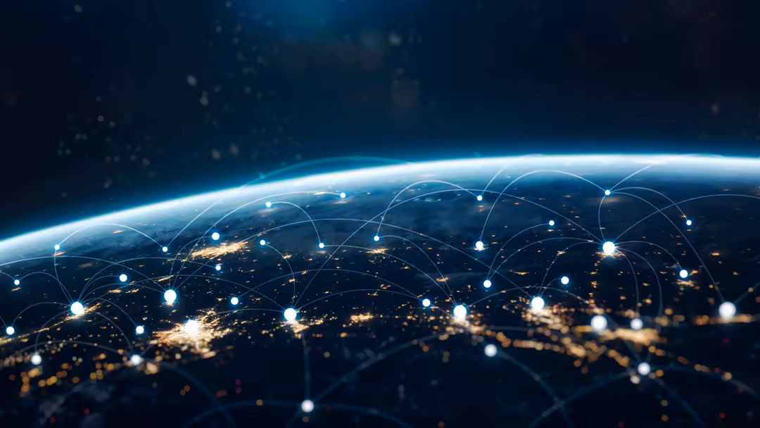 Earth with glowing network connections and digital nodes representing global data communication and interconnected technology