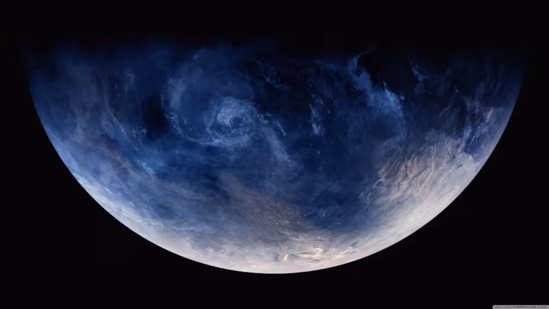 Blue planet Earth with white cloud formations and swirling atmospheric patterns against deep black space