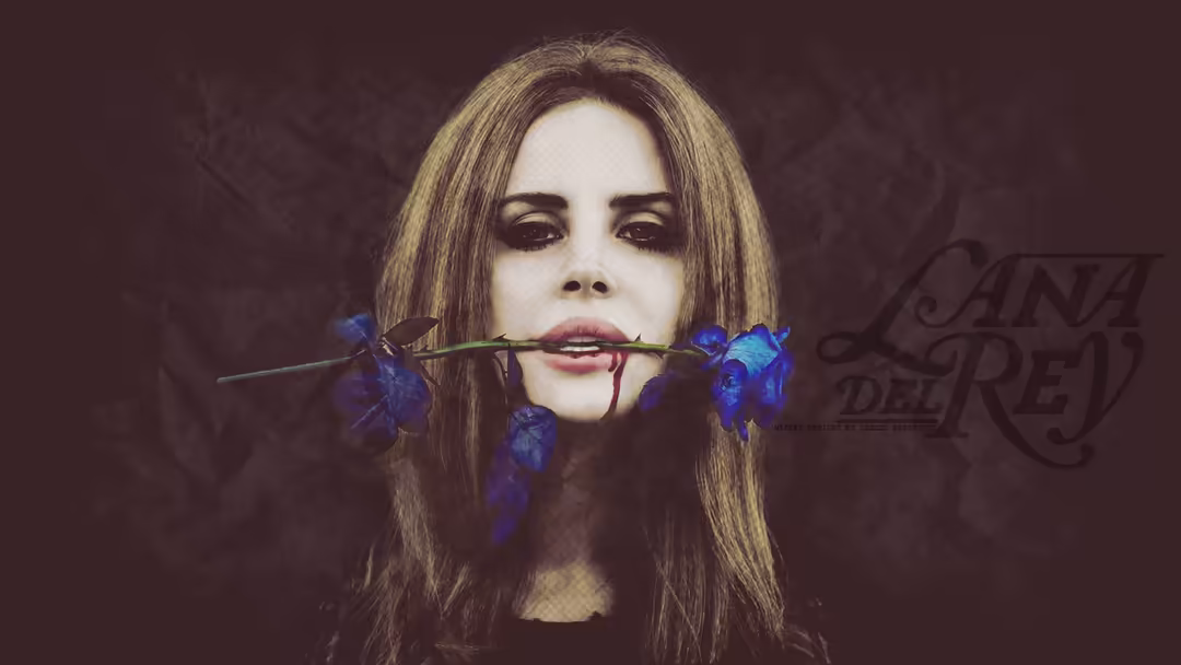 Dark-haired woman with pale complexion holding blue roses between her teeth against moody burgundy textured background with e