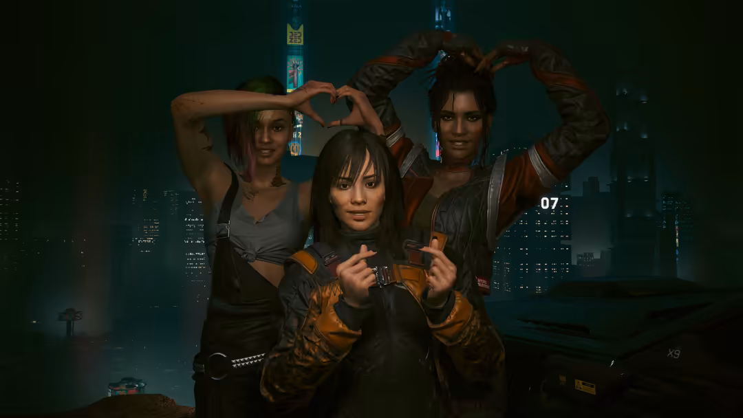Three stylish women posing together against a neon-lit cyberpunk cityscape at night, making heart gestures and playful expres