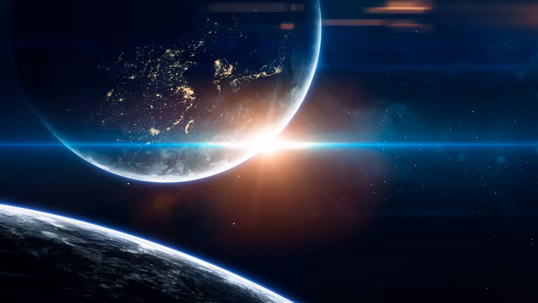 Illuminated Earth planet with city lights and glowing atmosphere at sunrise in cosmic space with distant stars and celestial
