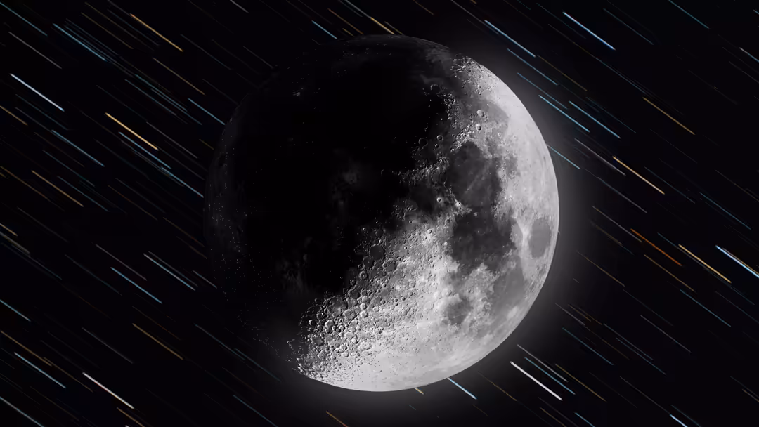 Detailed view of the moon with cratered surface against a starfield backdrop with shooting stars streaking across black sky