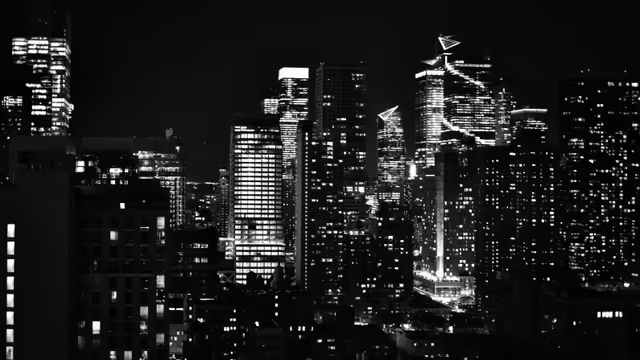 Illuminated City Skyline at Night