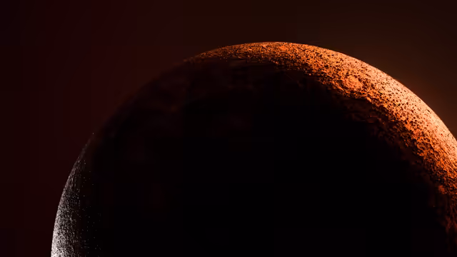 Moon Surface Illuminated In Darkness