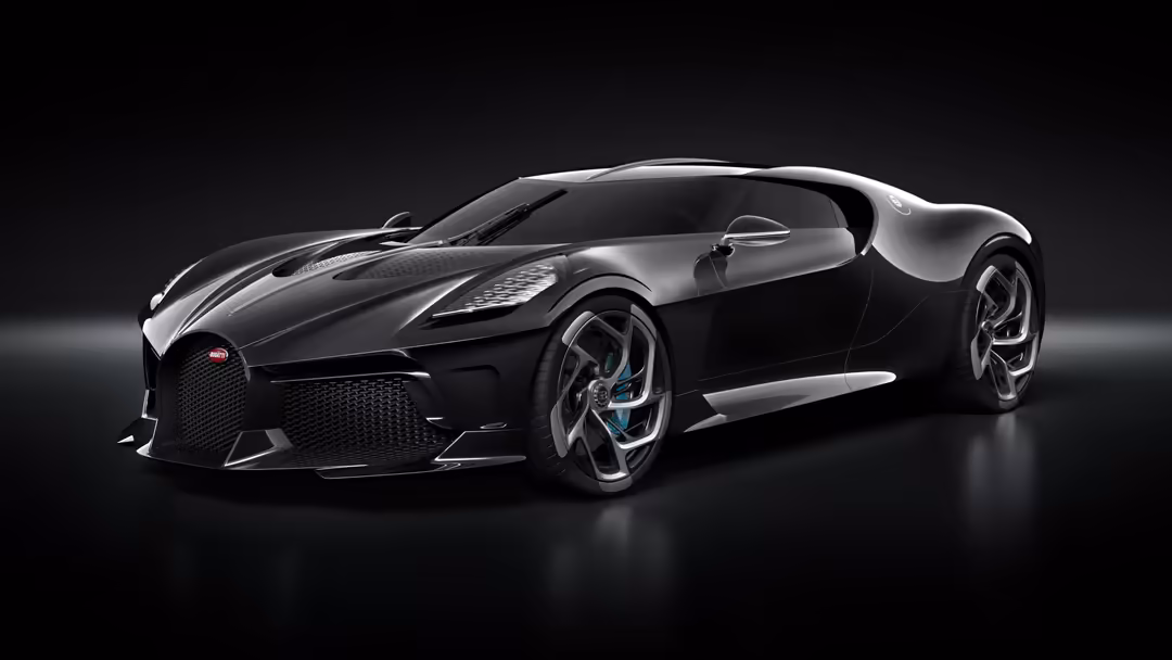 Sleek black Bugatti La Voiture Noire hypercar displayed against dark background, showcasing aerodynamic design and luxury cra