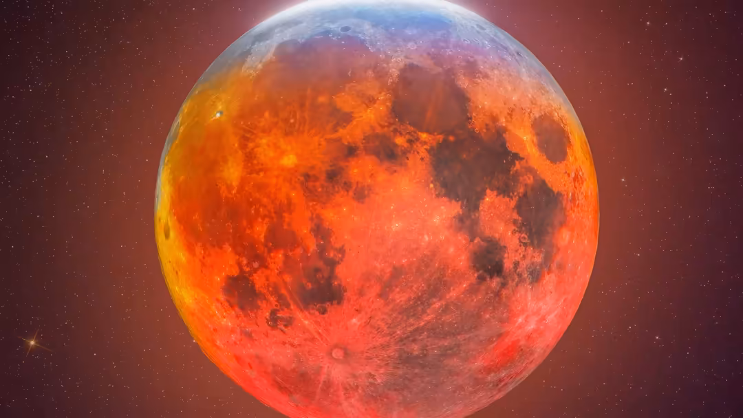 Dramatic blood moon glowing bright red and orange against dark starry sky, with detailed lunar surface visible