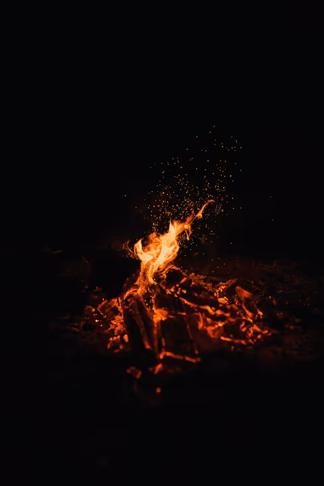 Bonfire Flames Against Black Night