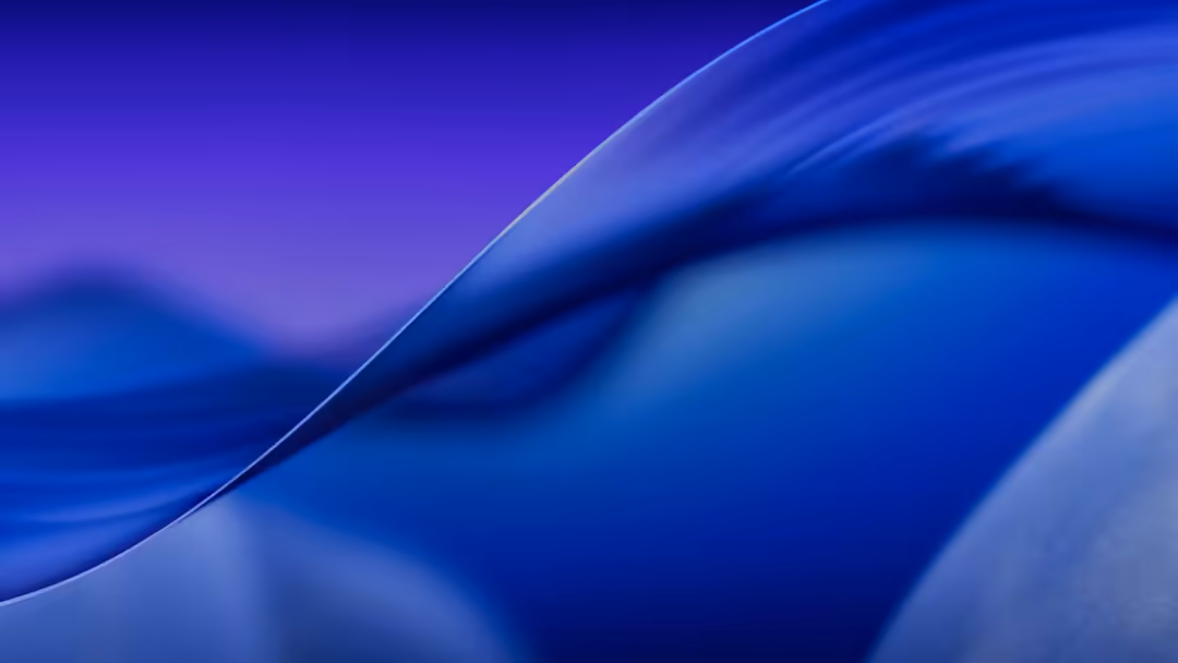 Abstract blue flowing waves with smooth curves and gradients, creating a dynamic and modern aesthetic perfect for MacBook bac