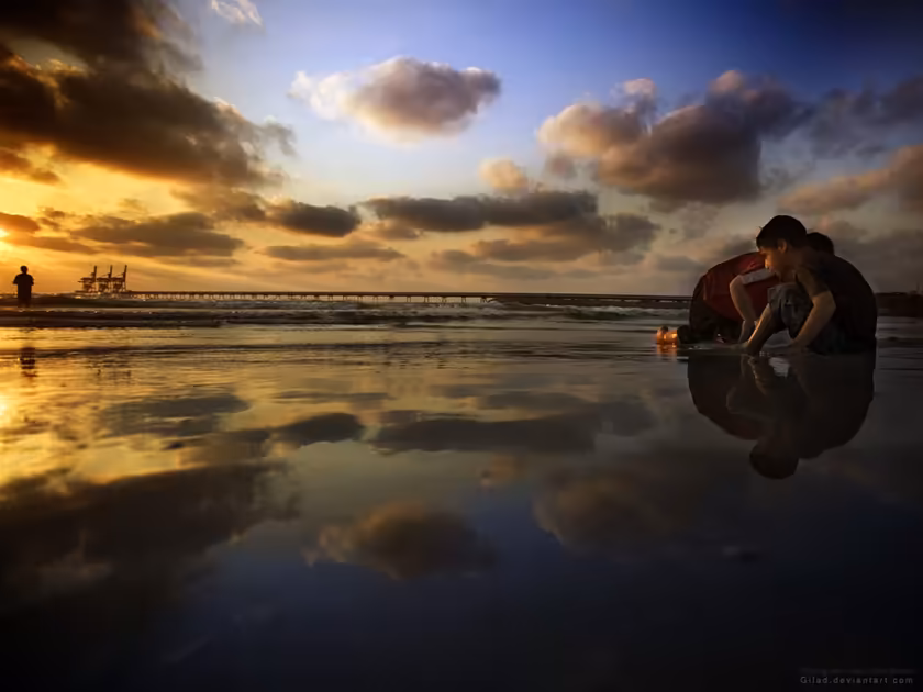 Golden Sunset Beach Reflection Moment