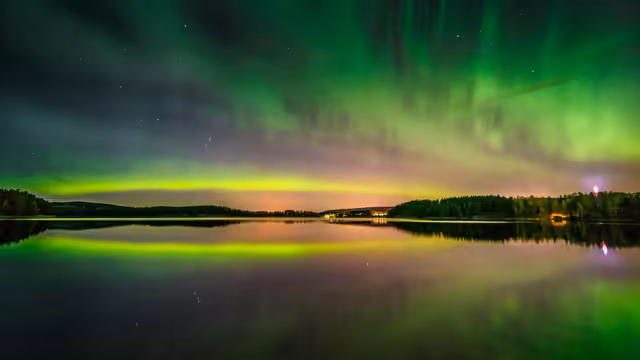 Aurora Borealis Over Calm Lake