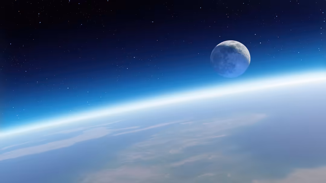 Earth's curved horizon with atmospheric glow and a full moon in starry space, depicting a cosmic view from orbit above the pl